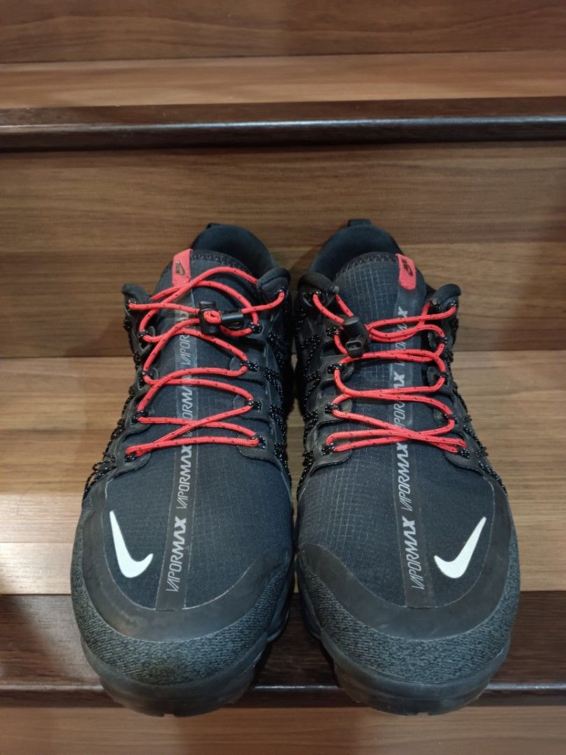 Vapormax with red shop laces