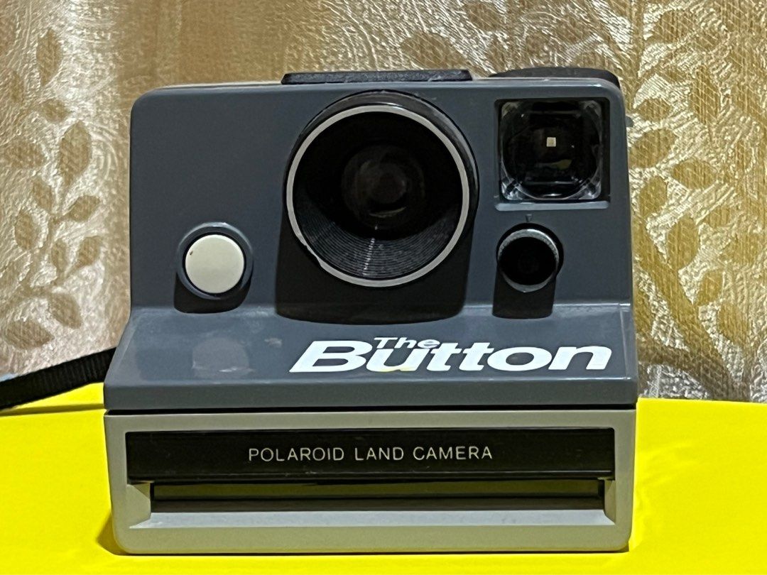 Polaroid land camera ( the button), Photography, Cameras on Carousell