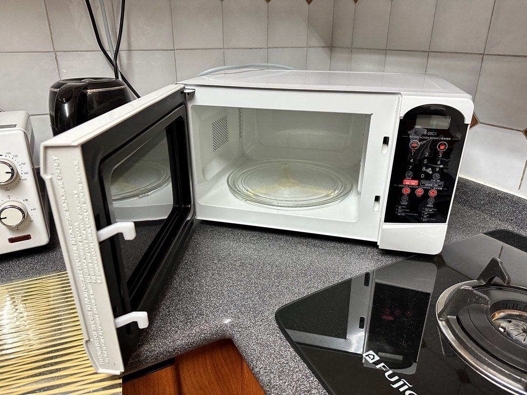 Sharp Microwave Oven R25C1, TV & Home Appliances, Kitchen Appliances, Ovens & Toasters on Carousell