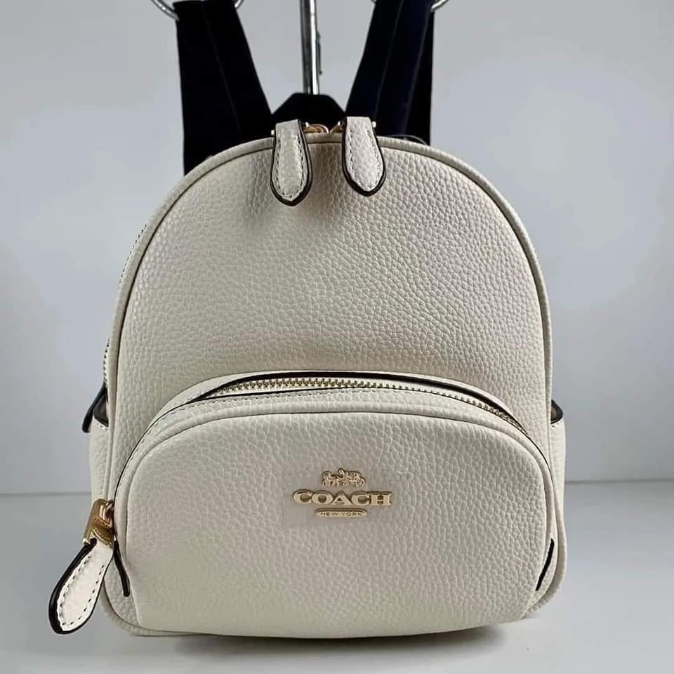 Coach mini court backpack on Carousell