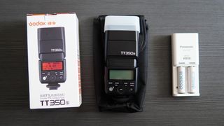 For Sale: Godox TT350s and pair Eneloop batteries with charger.