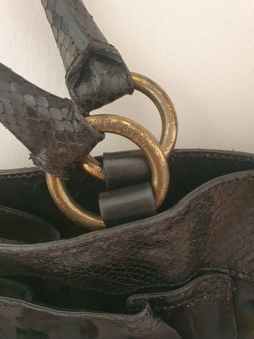 Just Cavalli black tote bag (Category: Tote Bags) located in Cebu City. Submitted by beebums (Listing ID 1218199153, Image 3). Description: pre owned.My personal bag. no inclusions. still very nice. metal tarnished, the rest of the bag still very good condition. see pictures for details. Original Just Cavalli Made in Italy.