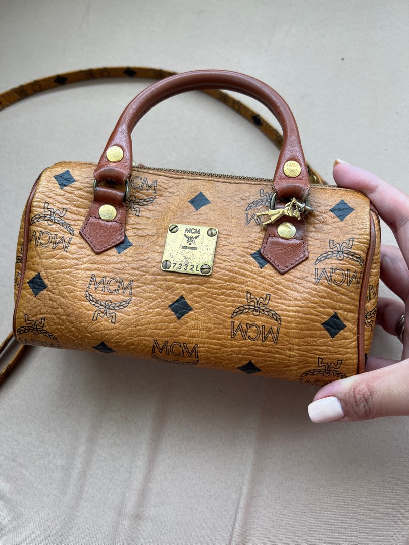 MCM mini sling bag, Luxury, Bags & Wallets on Carousell