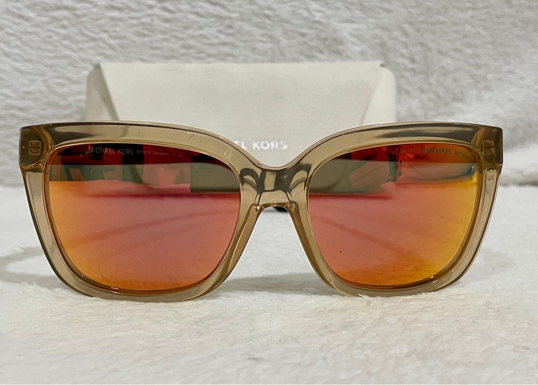 Michael Kors Sandestin (Category: Sunglasses & Eyewear) located in Cavite. Submitted by lam_decluttering (Listing ID 1218255042, Image 2). Description: Michael Kors MK6016 SANDESTIN Glossy brown Tortoise / Orange Mirror • almost new • no scratches or any issues • RFS: decluttering.