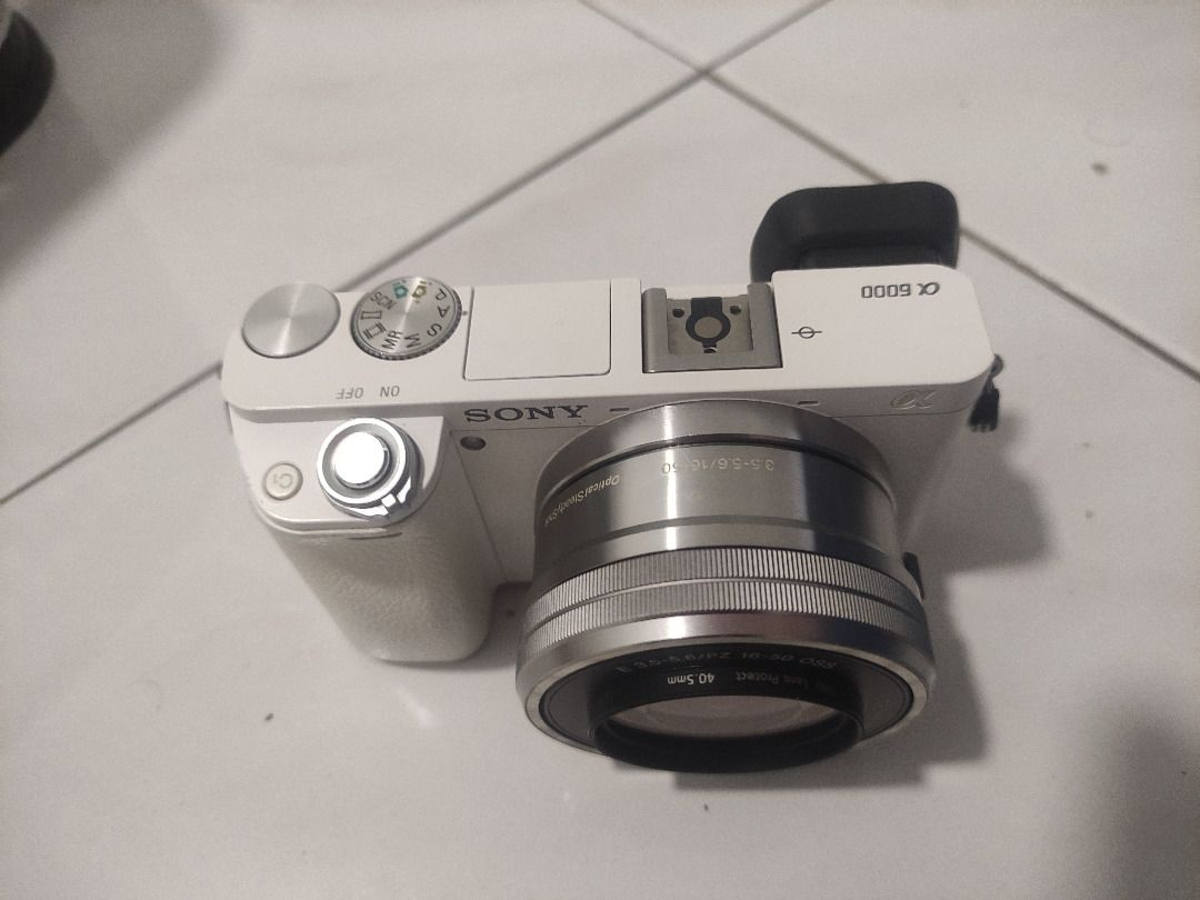 Sony A6000 with kit lens, Photography, Cameras on Carousell