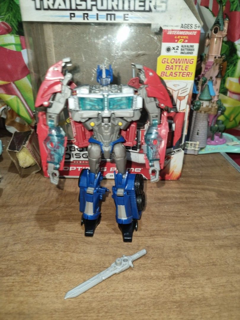 Transformers Prime Robot in Disguise Optimus Prime (Category: Action & Battle Toys) located in Silang. Submitted by samflores2k4t7 (Listing ID 1218367301, Image 2). Description: For sale Transformers Prime Robot in Disguise Optimus Prime 2011 hasbro 6 inches height With box and 1 weapon missing blaster Actual pics of the item posted.