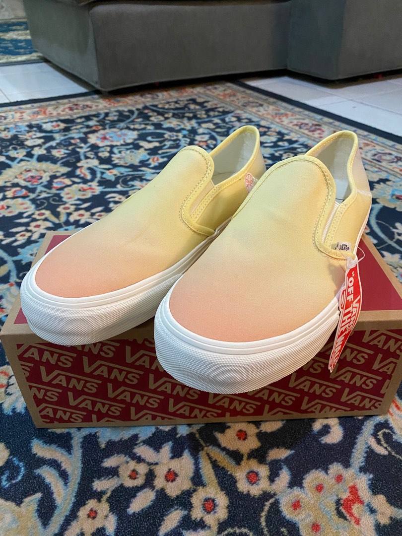 Pastel yellow shop slip on vans