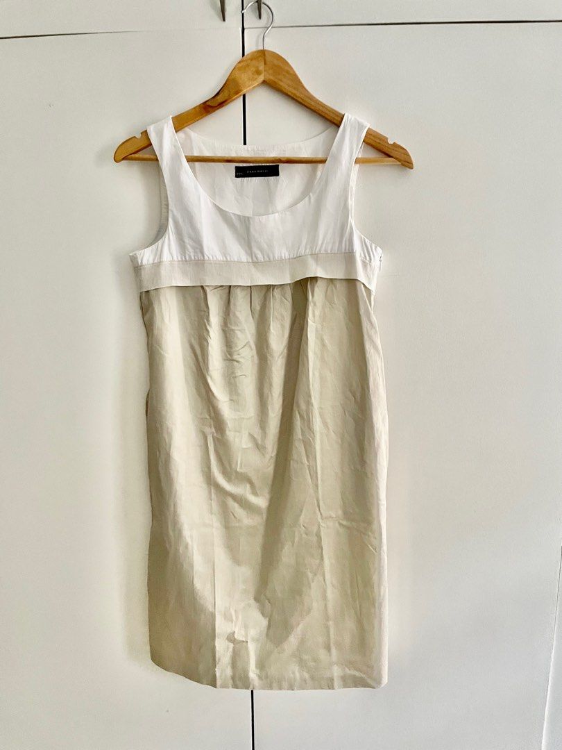 Zara Basic Empire Line Dress in Nude / White (Category: Dresses) located in Makati City. Submitted by winnieboop (Listing ID 1218292628, Image 1). Description: Love the fabric of this dress as it is so cool 😎 Very pretty and classy when worn Super perfect for the coming summer months! 🏖️ armpit to armpit- 16 inches length - 35 inches fits small to semi-medium.