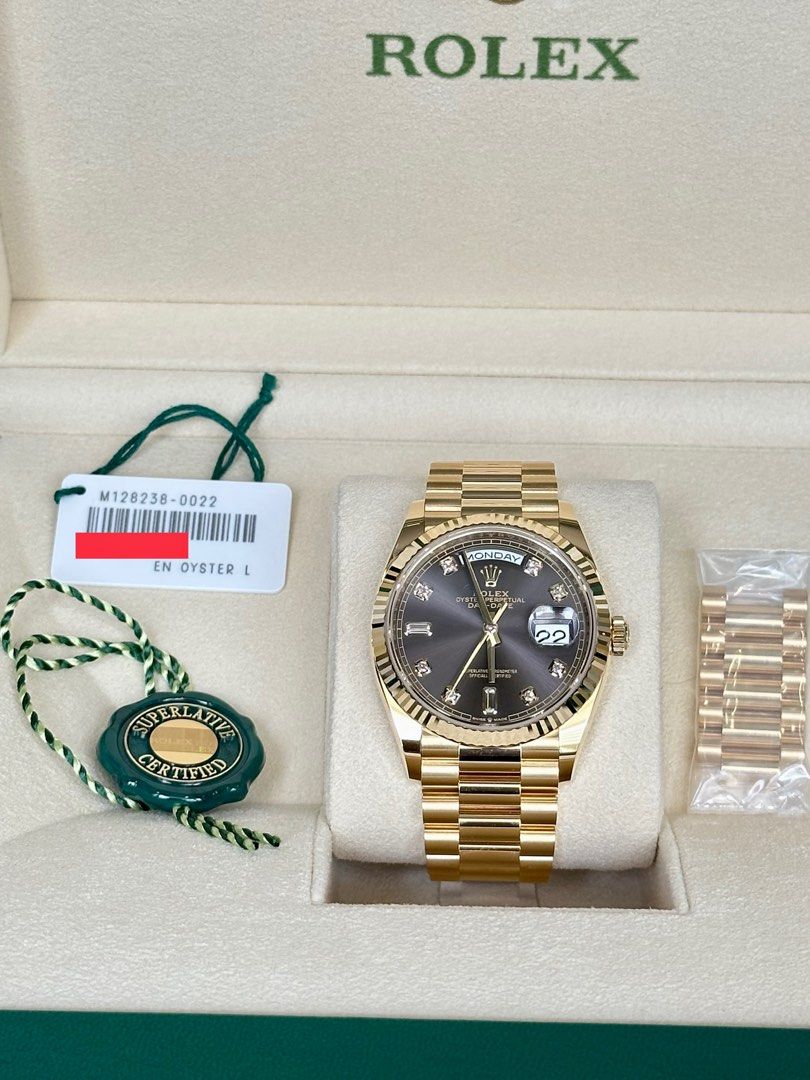 Brand new unworn Rolex Day Date 36 in dark grey dial diamond set