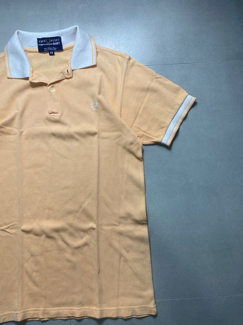 Fred Perry - Comme Des Garcons - Polo Shirt (Category: Tshirts & Polo Shirts ) located in Iloilo. Submitted by bygone.ph (Listing ID 1221796100, Image 3). Description: Fred Perry CDG Sleeves: 8.5" in Width: 18.5" in Length: 28" in Tag size: XS Material: 100% Cotton -no issue .