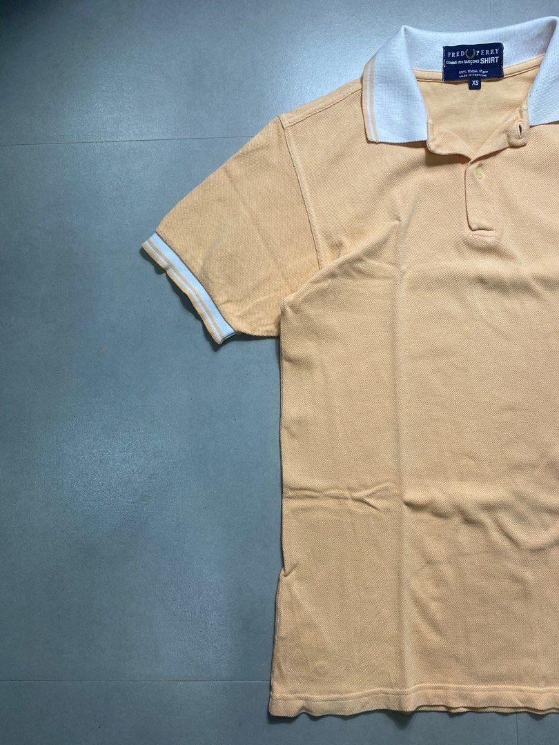 Fred Perry - Comme Des Garcons - Polo Shirt (Category: Tshirts & Polo Shirts ) located in Iloilo. Submitted by bygone.ph (Listing ID 1221796100, Image 2). Description: Fred Perry CDG Sleeves: 8.5" in Width: 18.5" in Length: 28" in Tag size: XS Material: 100% Cotton -no issue .