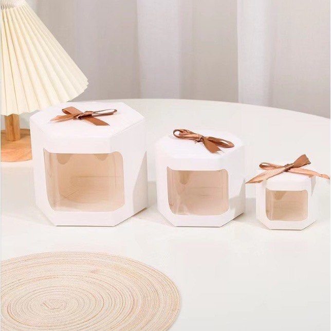 Hexagonal Transparent Window Pastry Box (Category: Storage Boxes & Baskets) located in Malabon City. Submitted by heyitskhen (Listing ID 1221686243, Image 1). Description: Features: Size: Small: 7x7x7cm-19 each Medium: 10x10x10cm-23 each Large: 13x13x13.5cm-28 each Color: white, brown Package Includes: 1pc Notes: Please allow minor errors due to manual measurement. The colors may be a little difference for the different monitor display. .