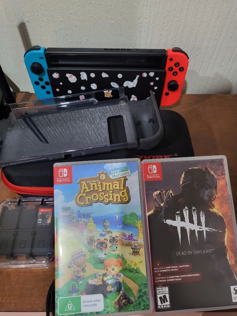 Nintendo Swith v2 with controller, games Animal Crossing, Dead by Daylight on Carousell