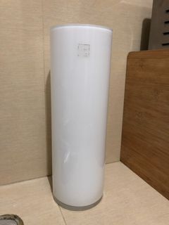 Tall white cylindrical vase