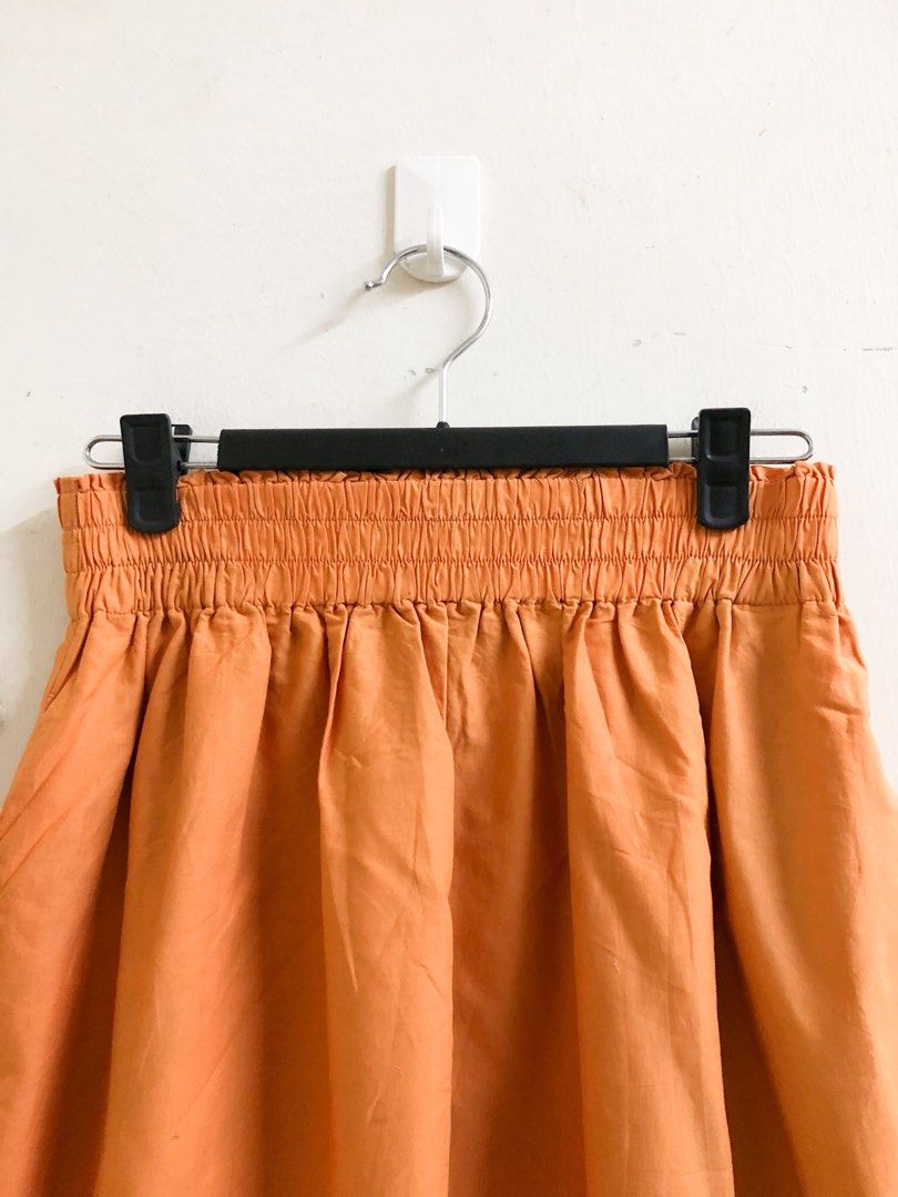 UNIQLO eyelet orange skirt