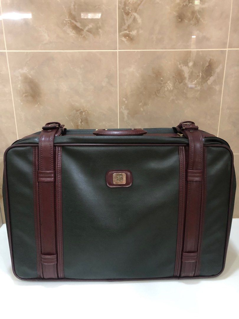 Vintage leather luggage (Category: Luxury Bags & Wallets) located in Quezon City. Submitted by favourite_things (Listing ID 1221792719, Image 1). Description: Dark green and maroon, 25”x18”x7”, good vintage condition. Please manage your expectations .