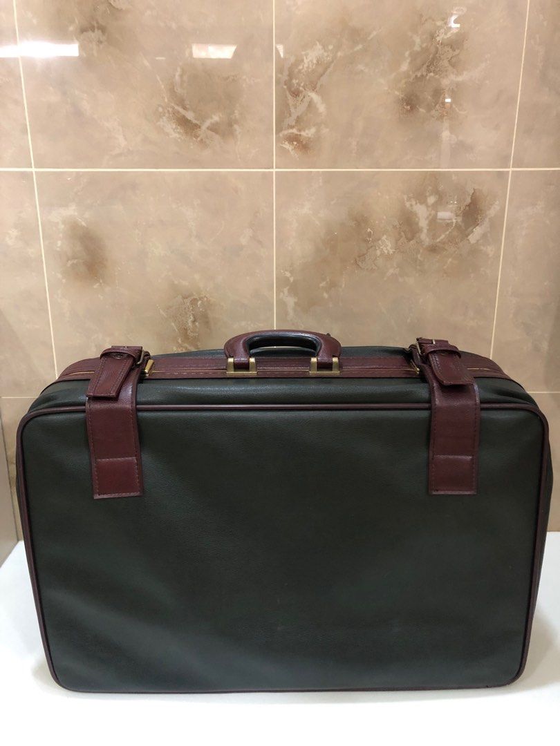 Vintage leather luggage (Category: Luxury Bags & Wallets) located in Quezon City. Submitted by favourite_things (Listing ID 1221792719, Image 2). Description: Dark green and maroon, 25”x18”x7”, good vintage condition. Please manage your expectations .