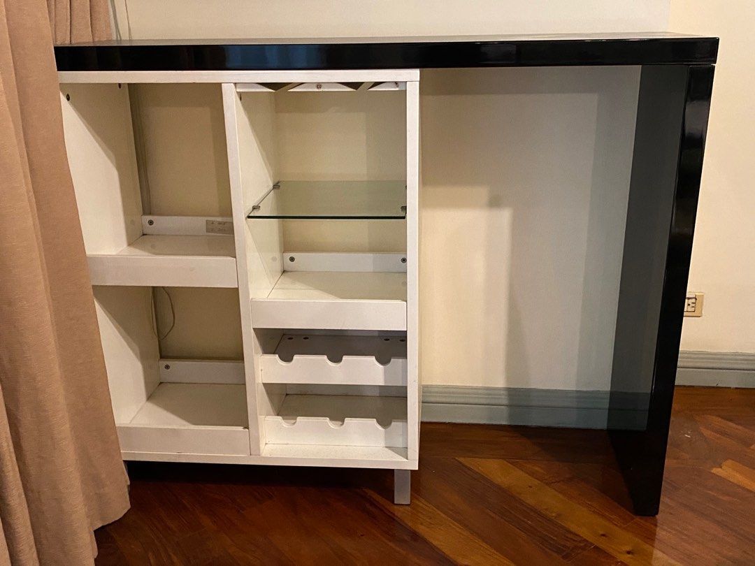 Bar Cabinet/Table (Category: Other Home Furniture) located in Quezon City. Submitted by kijurean (Listing ID 1221860319, Image 1). Description: Bar dimensions: W140 (cabinet W80cm) x D40x H110cm Note: wall shelves on photo NOT included.