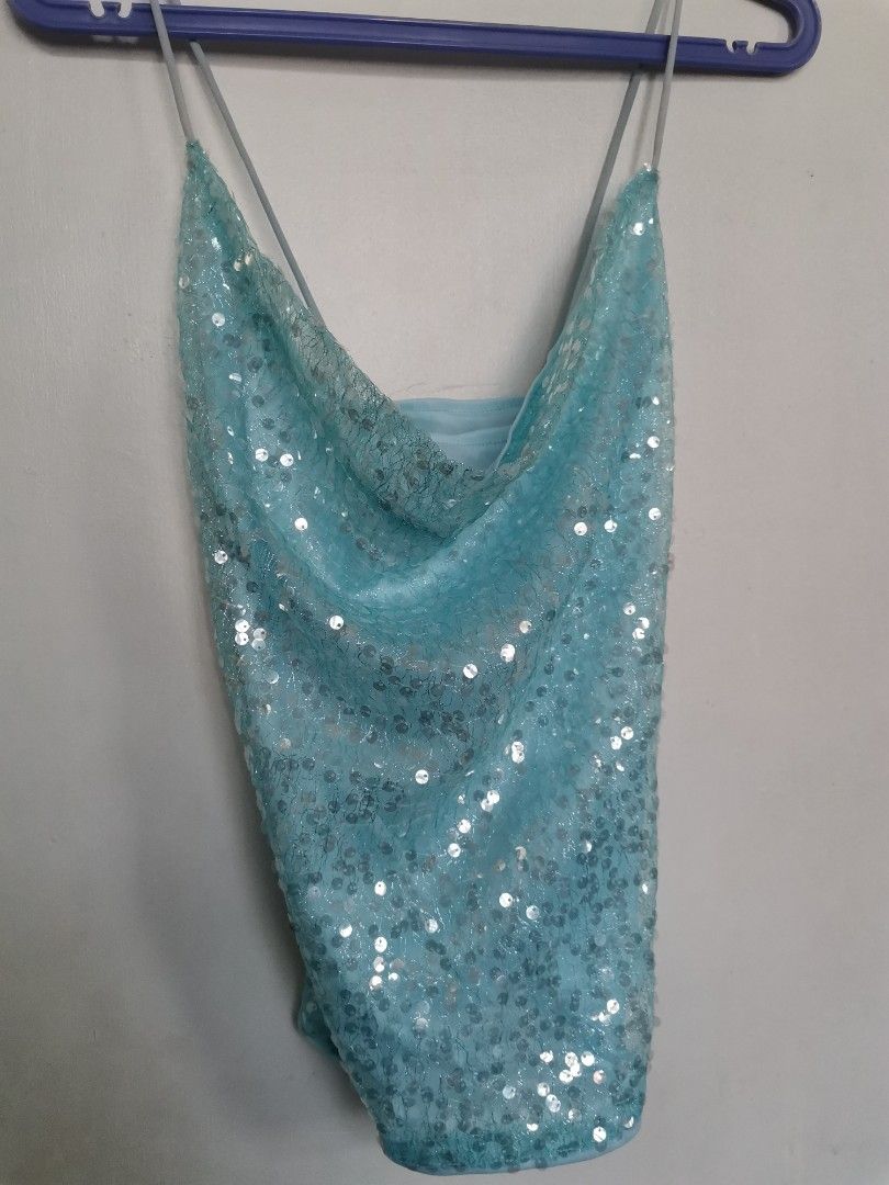 Shein blue sleeveless top (sequins top) (Category: Sleeveless) located in Marikina City. Submitted by declutterkpcloset (Listing ID 1221904914, Image 1). Description: Size: Medium RFS: wrong size :(.