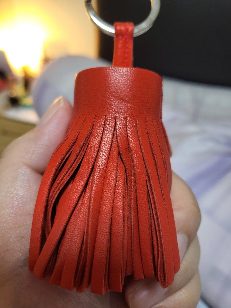 Red bag outlet charm