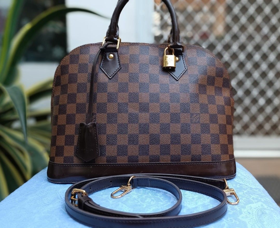 Louis Vuitton Alma BB DE (Category: Luxury Bags & Wallets) located in Las Pinas. Submitted by jvega08 (Listing ID 1221900940, Image 1). Description: alma bb DE with signs of usage can send pics for reference.. canvass and GHW in very good condition.. with dustbag lock/keys and local receipt LV greenbelt...