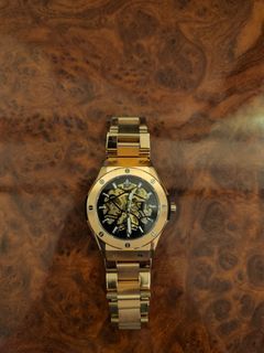 Rose Gold Skeleton Dial Watch