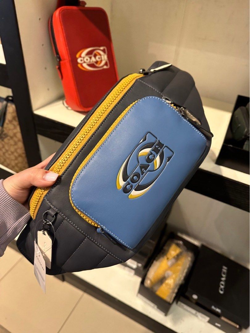 Coach voyager bag with store travel patches