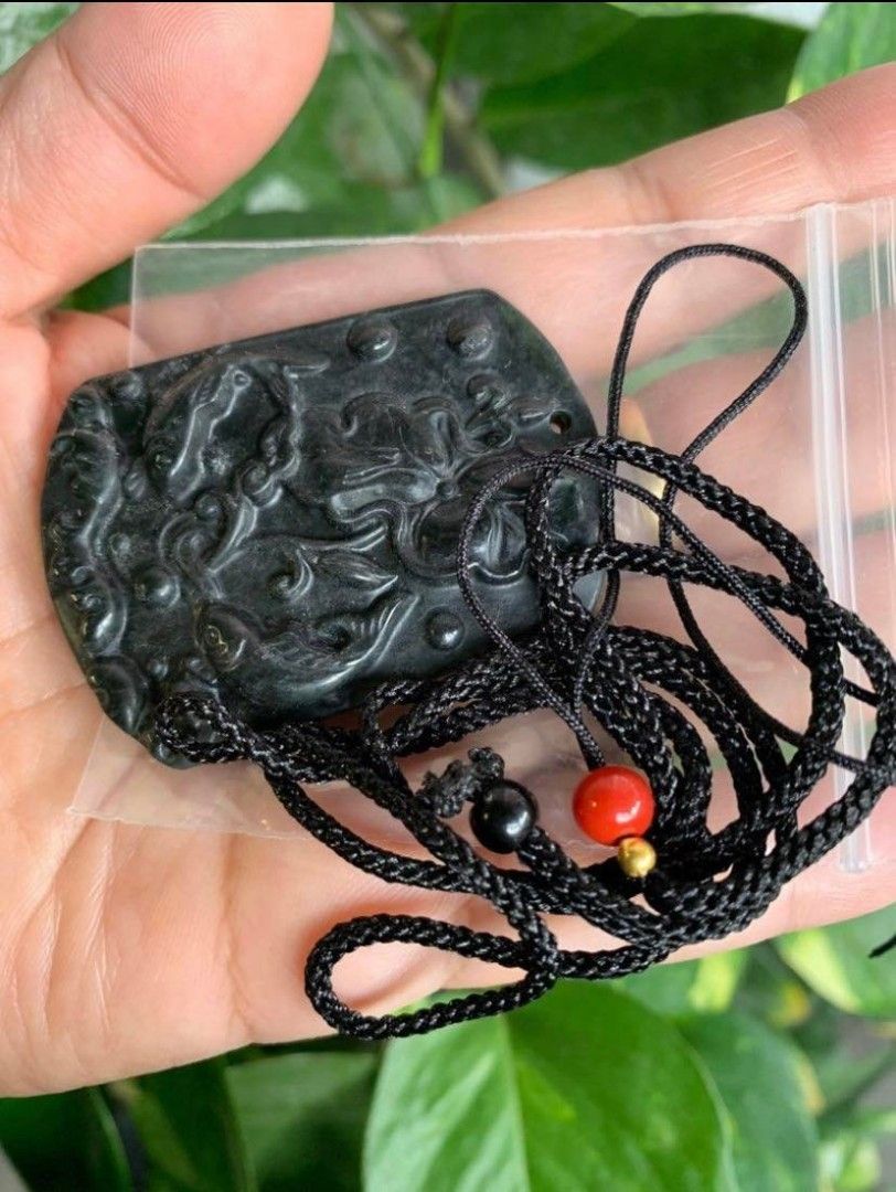Jade shop amulet necklace