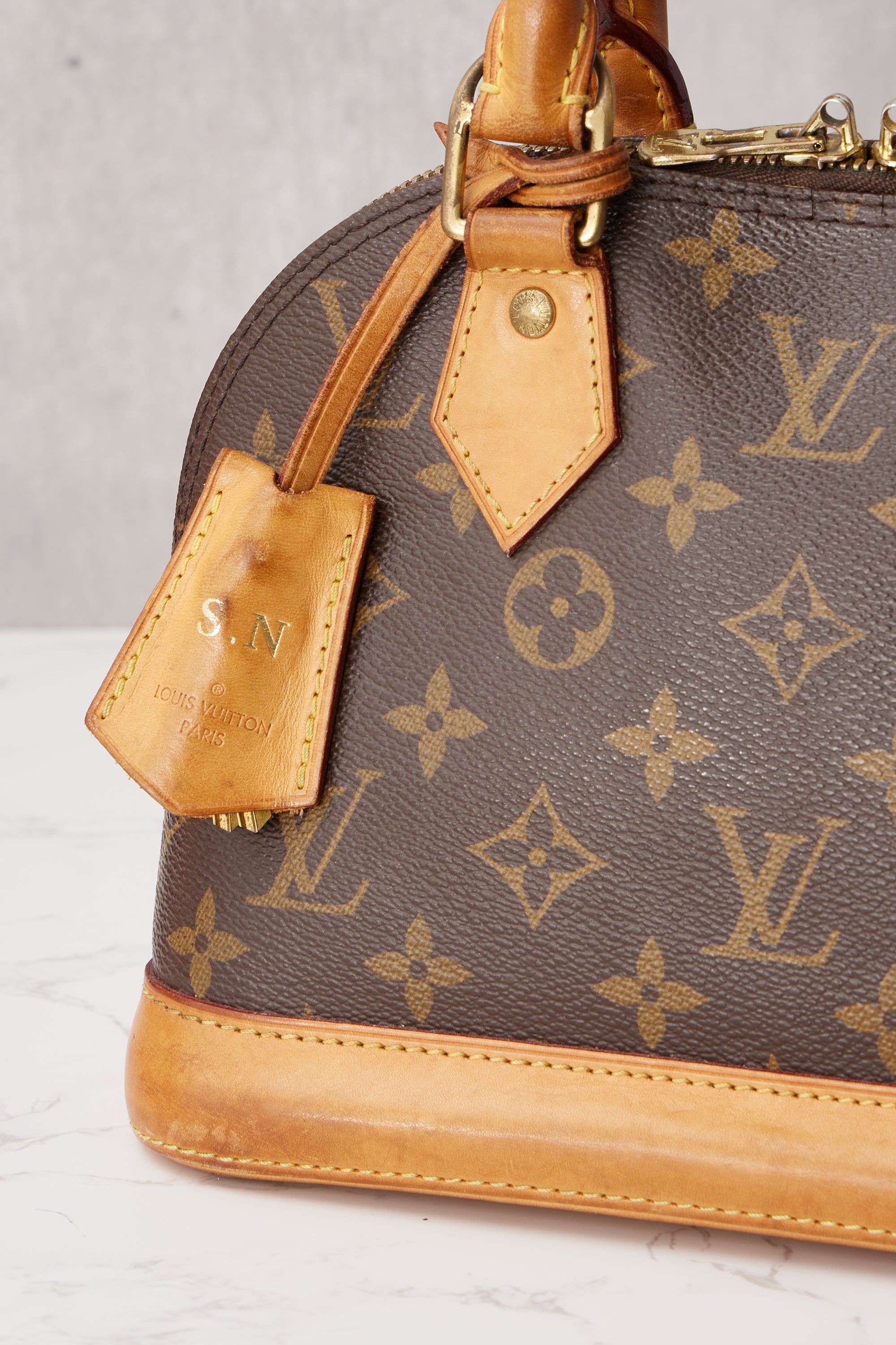 Like New Louis Vuitton Alma BB Monogram Canvas (Date Code: SN0261), Luxury,  Bags & Wallets on Carousell