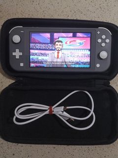 Nintendo Switch Lite (Gray) with pouch/carrier and charging cable