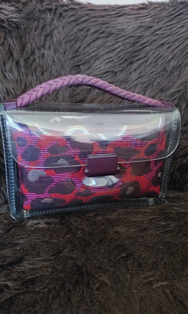 Pop & Suki Lyra Satchel (Category: Luxury Bags & Wallets) located in Taytay. Submitted by luxebagcray (Listing ID 1222066680, Image 1). Description: Pop & Suki transparent bag with removable pouch. Great condition, thick plastic. No strap included. Comes with dustbag. Final price posted!.
