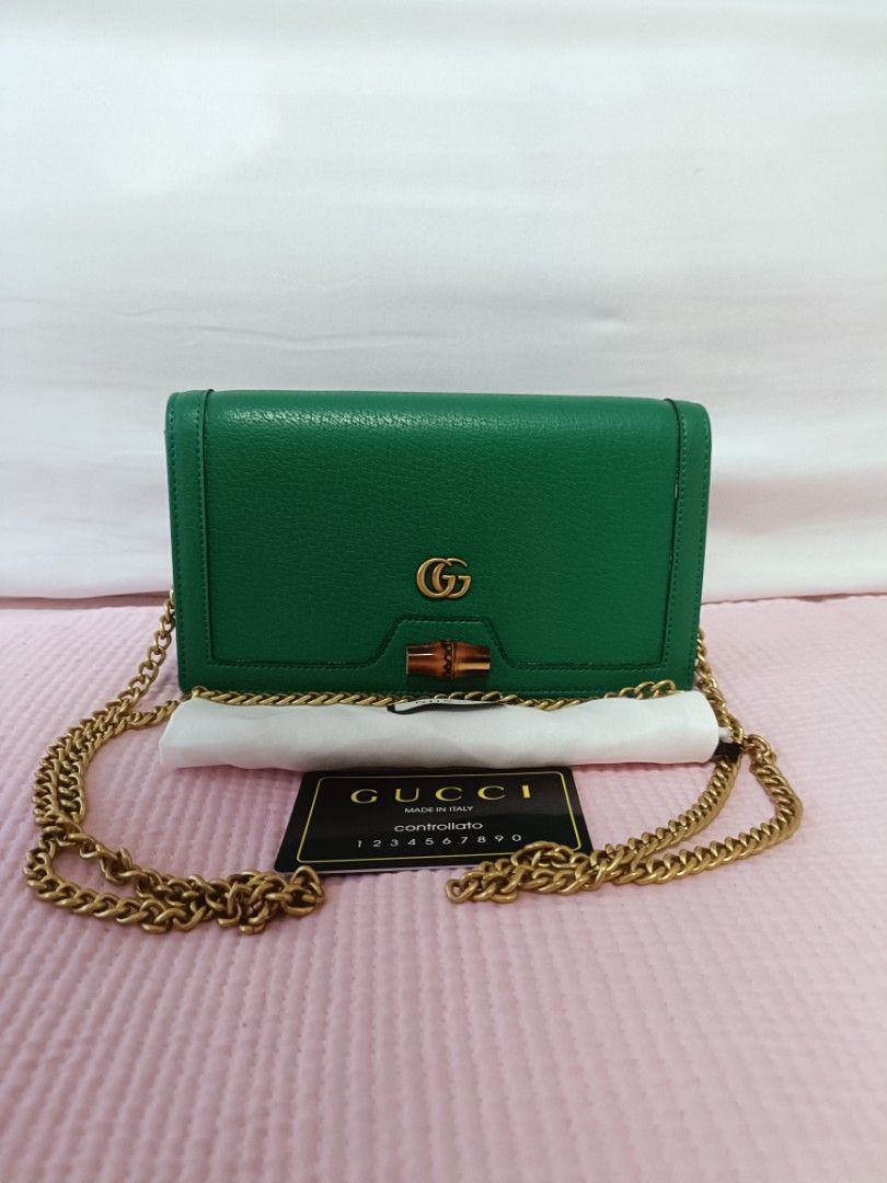 Preloved Diana Mini Bag with Bamboo (Category: Luxury Bags & Wallets) located in Cebu City. Submitted by elcoleccion21 (Listing ID 1222050340, Image 1). Description: Japan Source bag Emerald green leather Antique gold-toned hardware Moiré and microfibre lining with suede-like finish Double G Bamboo detail Inside: 2 card slots and 1 hook Chain shoulder strap with 54cm drop Snap button closure.