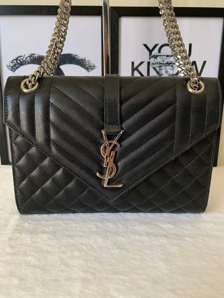 Saint Laurent Medium Envelope Chain Bag (Category: Luxury Bags & Wallets) located in Manila. Submitted by bagislifeshop (Listing ID 1222125177, Image 2). Description: ▪️Saint Laurent Medium Envelope Chain Bag▪️ ☑️Available in Pampanga ✅Condition: 8.8/10 ✅Dimensions: 24x17.5x6 cm ✅Material: Grained calf leather ✅Colour: Black in SHW ✅Inclusions: Replacement dustbag.
