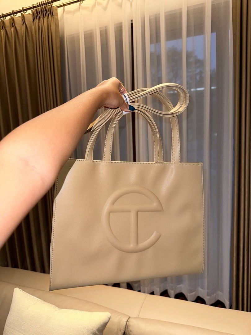 *REPRICED* Telfar Medium in Cream (Category: Luxury Bags & Wallets) located in Calamba. Submitted by m.cag (Listing ID 1202044390, Image 1). Description: ON HAND READY TO SHIP.