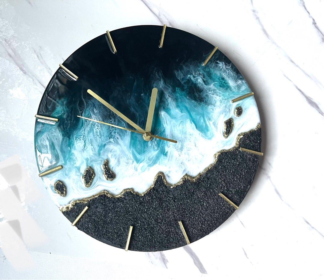 wall clock (Category: Clocks) located in Singapore. Submitted by gee68 (Listing ID 1222176830, Image 3). Description: Resin art seascape wall clock with texture in black and white with golden hands size: 30cm diameter the clock is made with resin and pigments on wood panel embellished with glass crystals ..its a beautiful piece of art other needle options available can be made with silver hands & other colors too preorder...ready in 3-4 days cloc