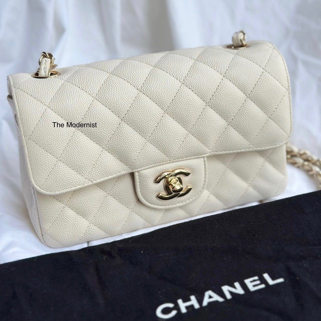 Authentic Chanel Ivory Caviar Leather Mini Flap Bag Light Gold Hardware,  Luxury, Bags & Wallets on Carousell
