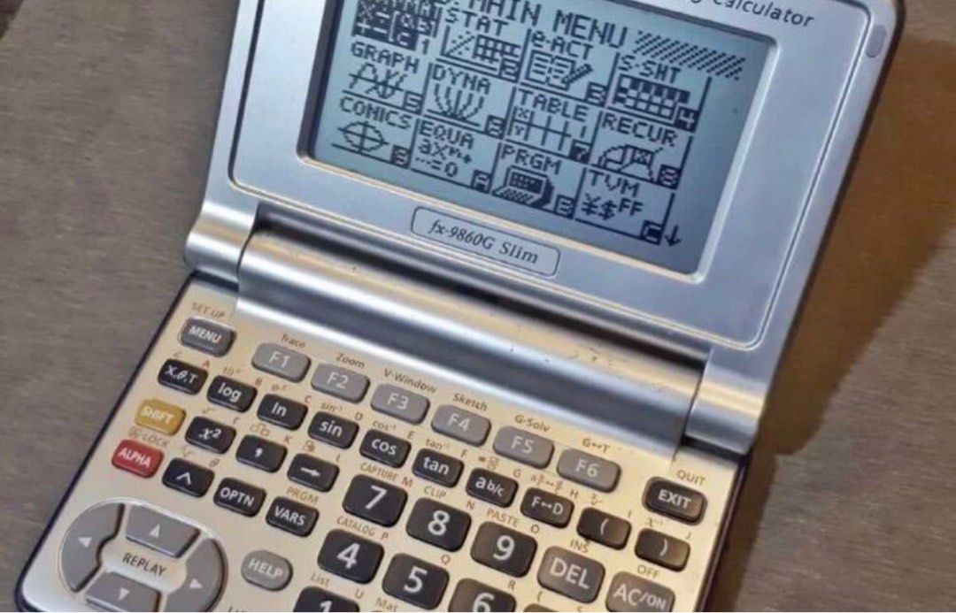 Casio slim fx 9860g graphing calculator, Computers & Tech, Office ...