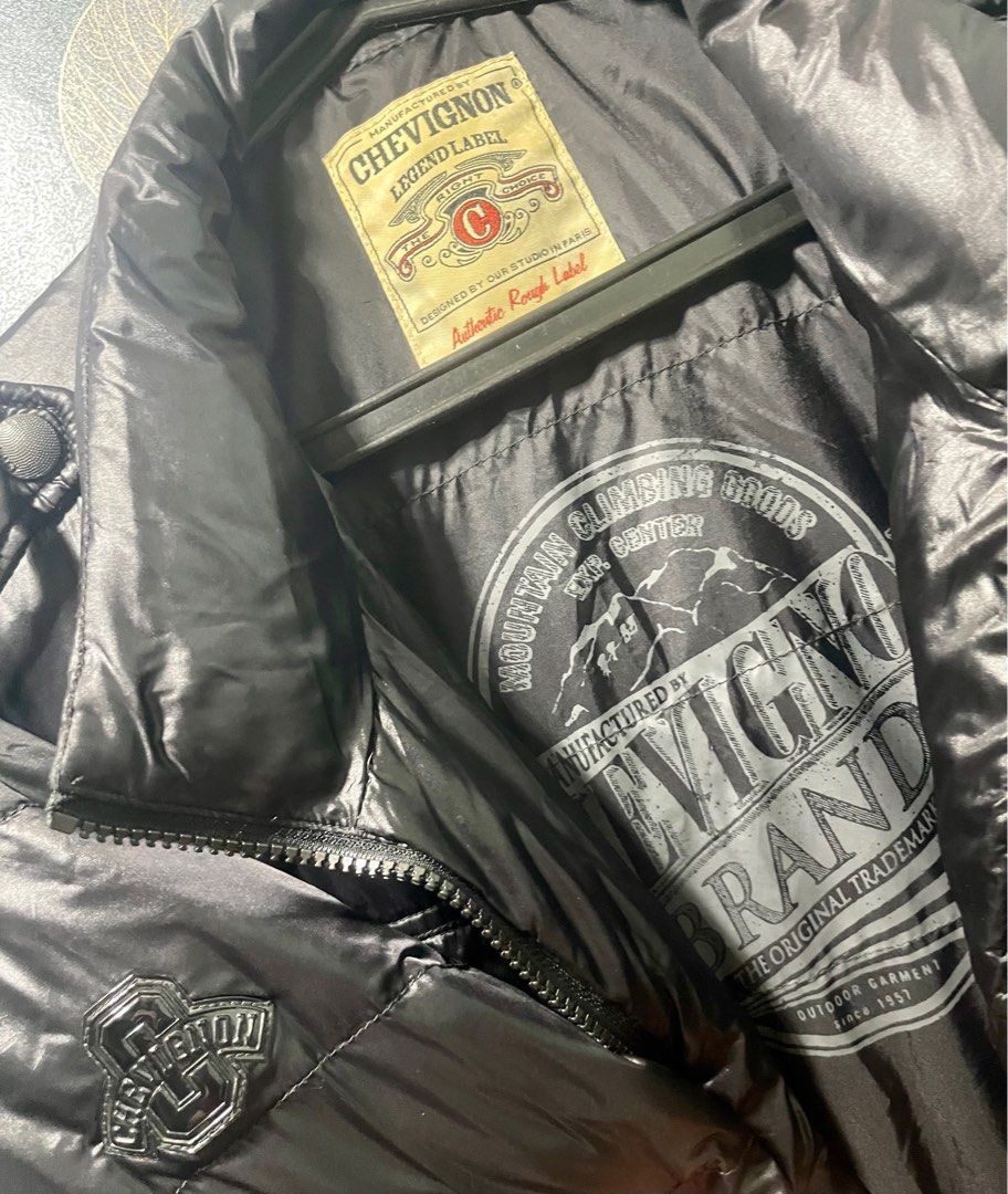 Black Puffer Jacket (Category: Coats, Jackets and Outerwear) located in Taguig. Submitted by kengarcia.0407 (Listing ID 1222410025, Image 3). Description: Chevignon black puffer Jacket (Vintage) (Authentic) Width20 L29 Cloth/Color Rate - 9.5/10 Size: XL on Tag but fits L frame Very Good condition RFS: Decluttering.