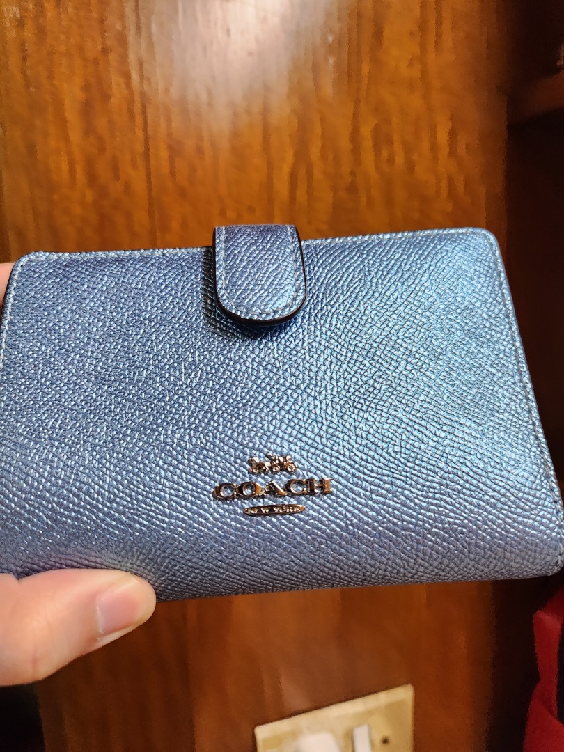 Coach blue shiny wallet on Carousell