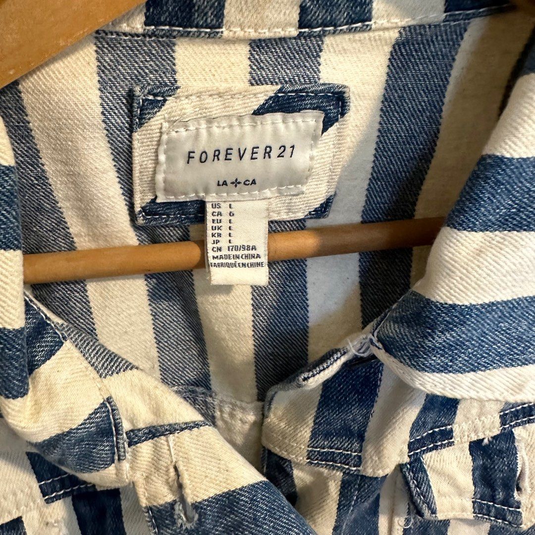 Forever 21 Striped Denim Jacket (Category: Coats, Jackets and Outerwear) located in Cavite. Submitted by daphnesea (Listing ID 1222272918, Image 2). Description: Cropped.