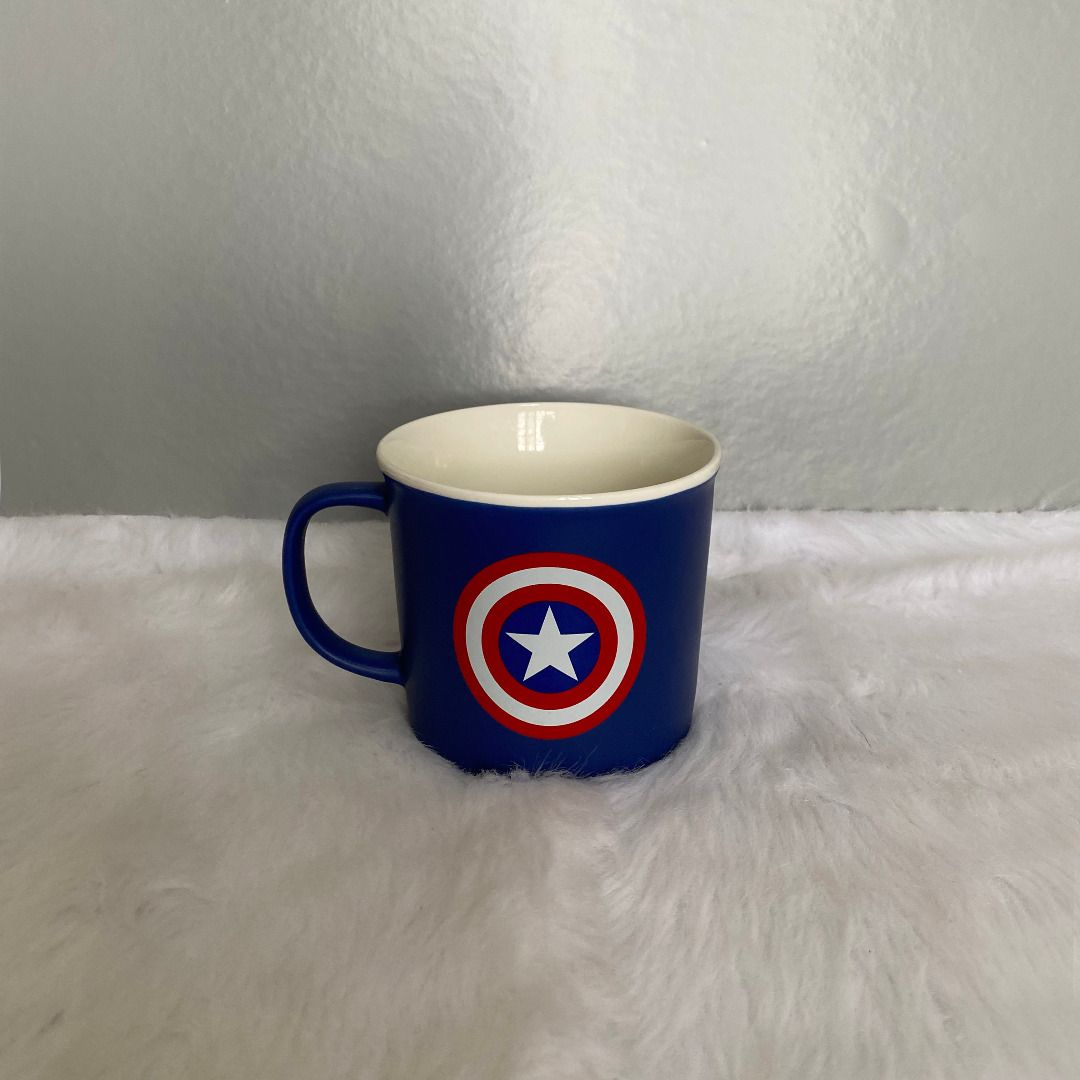 Marvel Rare Captain America Blue Mug (Category: Coffee & Tea Tableware) located in Consolacion. Submitted by posh_avenue_home (Listing ID 1222353075, Image 1). Description: In very good condition. From Japan. 3.5" x 3.75"..