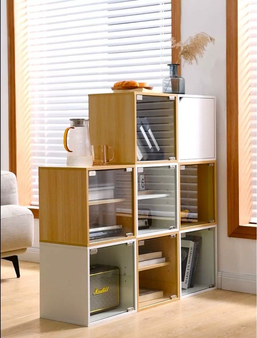 MODULAR (Category: Shelves, Cabinets & Racks) located in Singapore. Submitted by winsonzz (Listing ID 1222398738, Image 3). Description: Welcome to MODULAR 👋🏼 Growing Inventory day by day Create spaces where people connect ✨MODULAR Cabinets Series✨ Color Options ⚪️🟤🪵 ✅White ✅Brown ✅Wood Design 📦- Refer to Image 9️⃣ A - ✅Hollow B - ✅Halved Shelving + $2 C - ✅Door + $2 D - ✅Glass Door + $3 E - ✅Glass Door with Halved Shelving + $3 Add-On Item 