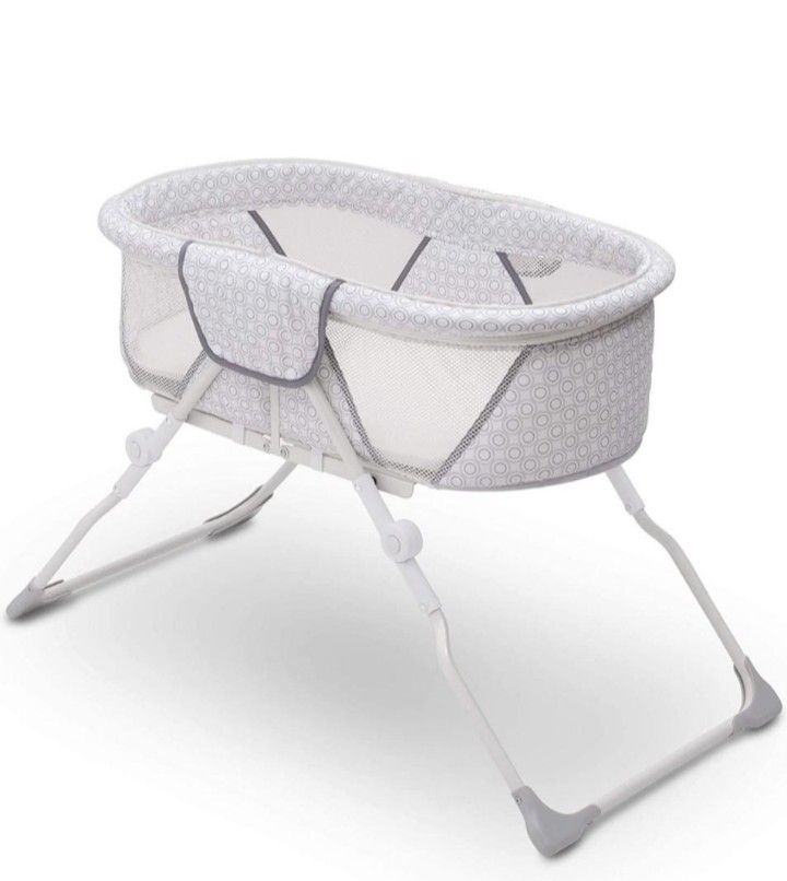 Delta Children EZ Fold Ultra Compact Travel Foldable Baby Bassinet with free head and body pillow