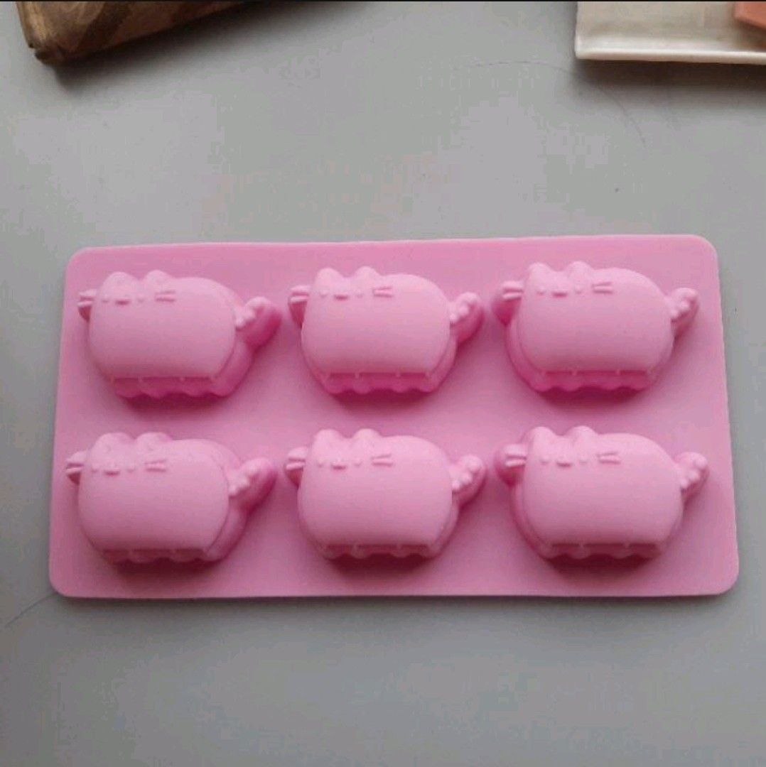 PUSHEEN Pink Silicone Chocolate Ice Mold (Category: Cookware & Accessories) located in Batangas. Submitted by jomiella (Listing ID 1222297502, Image 1). Description: Condition: Like New FAQ: ♡Last price? -Depends on the item ♡Swap? -No, sorry. Listed items are not open for swap ♡Can you list the item on Shop3e? -Yes! But I'm gonna have to add an additional fee of 8% for the Shop3e service fee ♡Do you do meetups? -Yes. Batangas area only THINGS TO