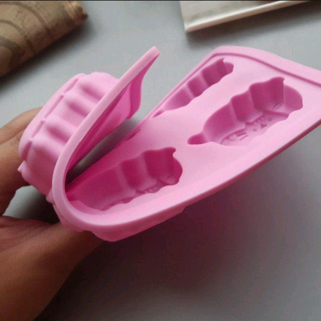 PUSHEEN Pink Silicone Chocolate Ice Mold (Category: Cookware & Accessories) located in Batangas. Submitted by jomiella (Listing ID 1222297502, Image 3). Description: Condition: Like New FAQ: ♡Last price? -Depends on the item ♡Swap? -No, sorry. Listed items are not open for swap ♡Can you list the item on Shop3e? -Yes! But I'm gonna have to add an additional fee of 8% for the Shop3e service fee ♡Do you do meetups? -Yes. Batangas area only THINGS TO