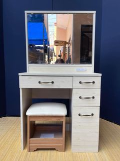 Vanity Dresser w/ Stool 28”L x 18”W x 51”H  3 door mirror cabinet 4 pullout drawers 2 power outlets In good condition