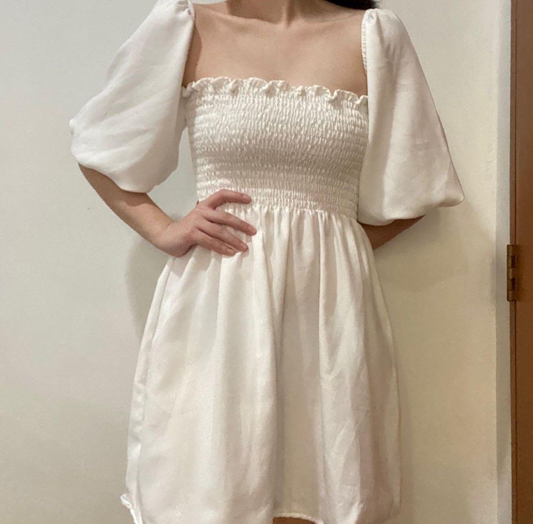 White puff sleeve dress (Category: Dresses) located in Marikina City. Submitted by declutterkpcloset (Listing ID 1222316676, Image 1). Description: Fits to small-medium DM for more pictures..