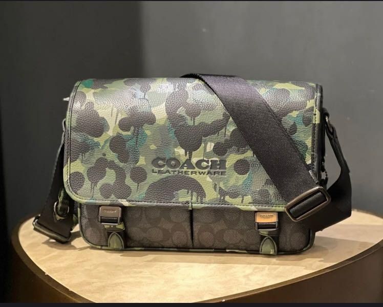 Coach camo messenger bag deals