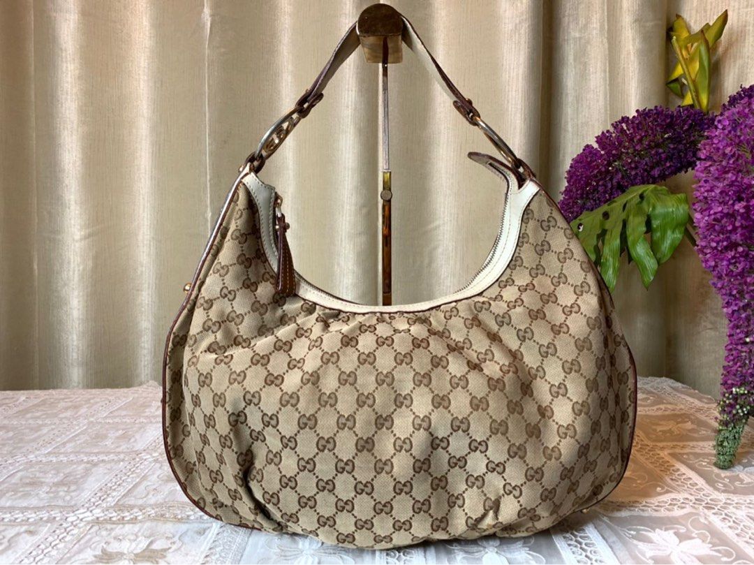 Gucci gg online canvas shoulder bag