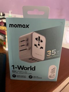 Momax 1-World Universal Travel Adapter with Multiple USB ports (35W)